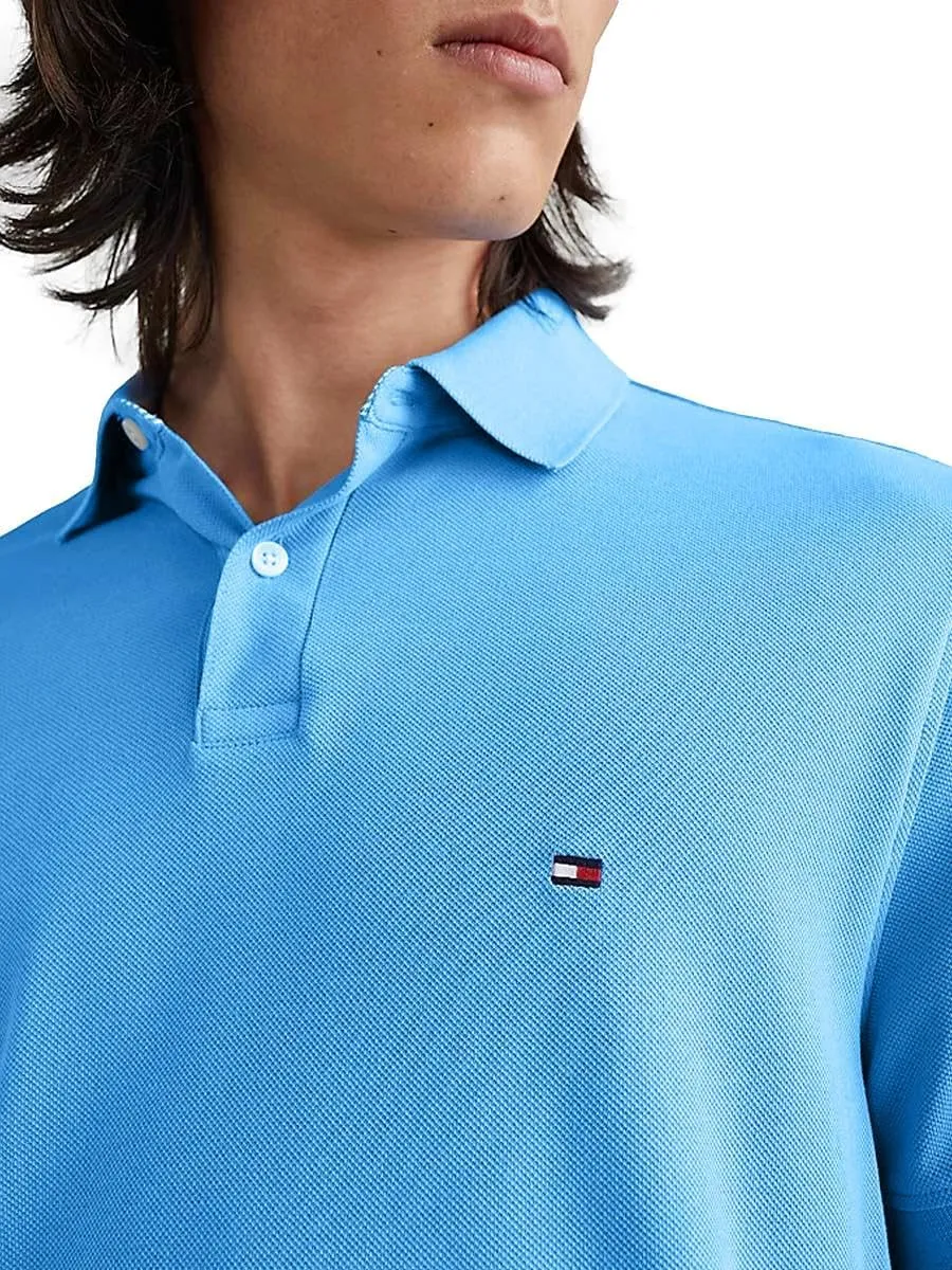 Tommy Hilfiger Men's Regular Fit Solid Color Short Sleeve Stretch Pique Polo Shirt